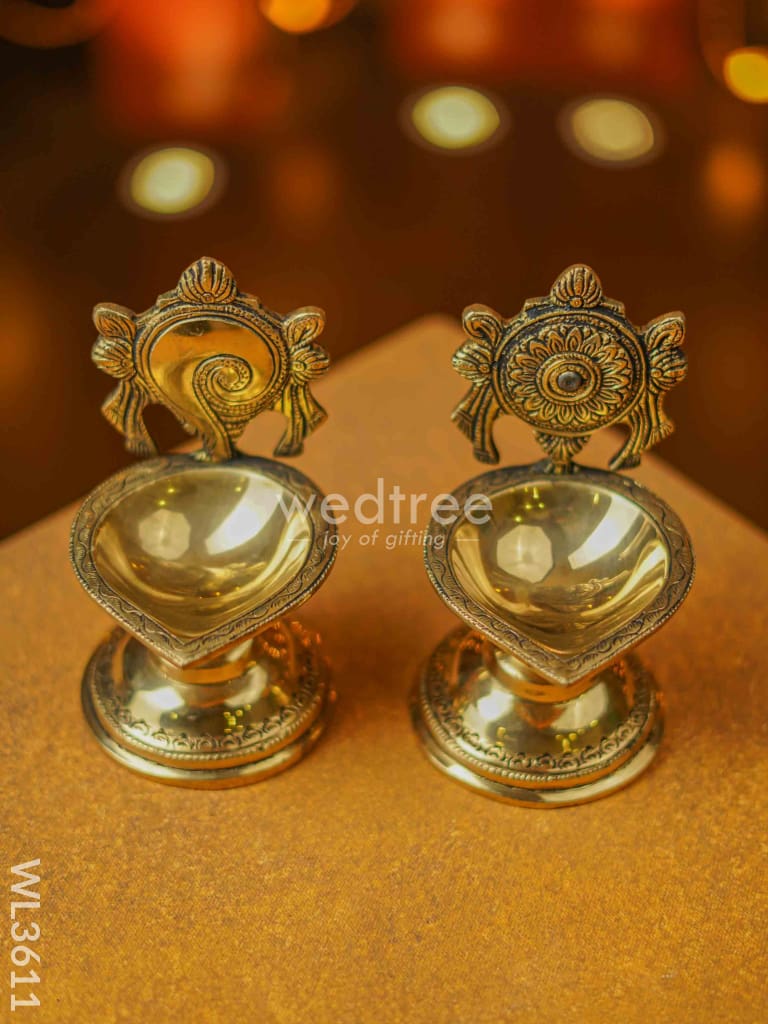 Brass Shanku Chakra Diya With Stand - Set Of 2 Wl3611