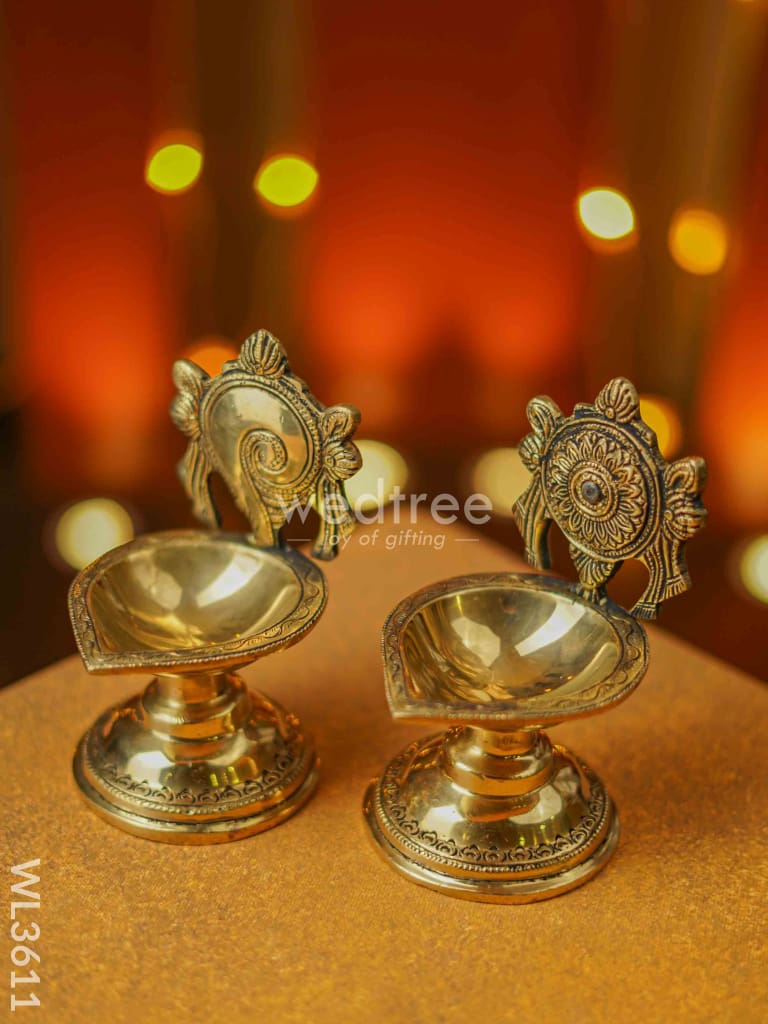 Brass Shanku Chakra Diya With Stand - Set Of 2 Wl3611