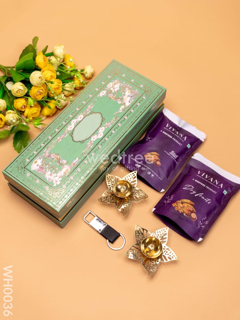 New Year Hamper 2 - Brass Diya Keychain And Dry Fruits Wh0036 Hampers