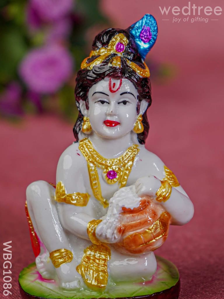 Polyresin Butter Krishna Idol - Wbg1086 Home Decors