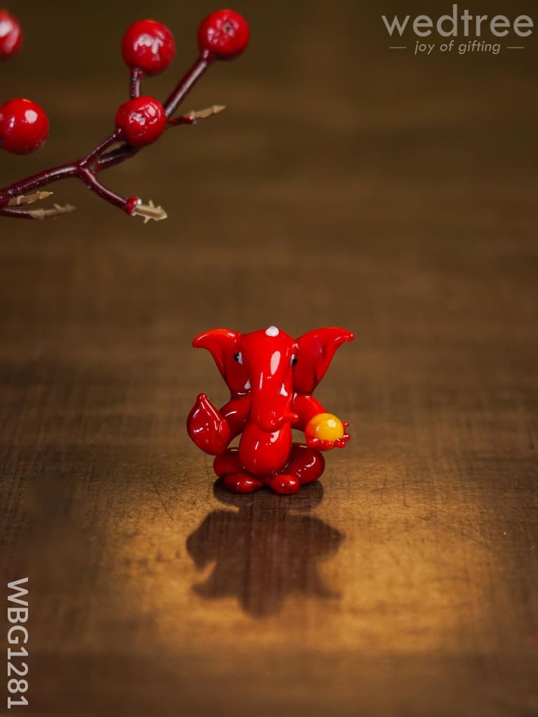 Soda Glass Miniature Ganesha With Laddu - Wbg1281 Divine Figurines