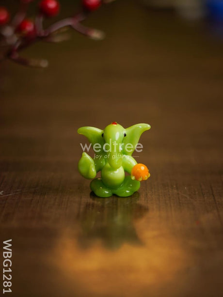 Soda Glass Miniature Ganesha With Laddu - Wbg1281 Divine Figurines