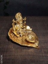 White Metal Ganesha In Pipal Leaf With Diya Gold Finish - W3630 Diyas