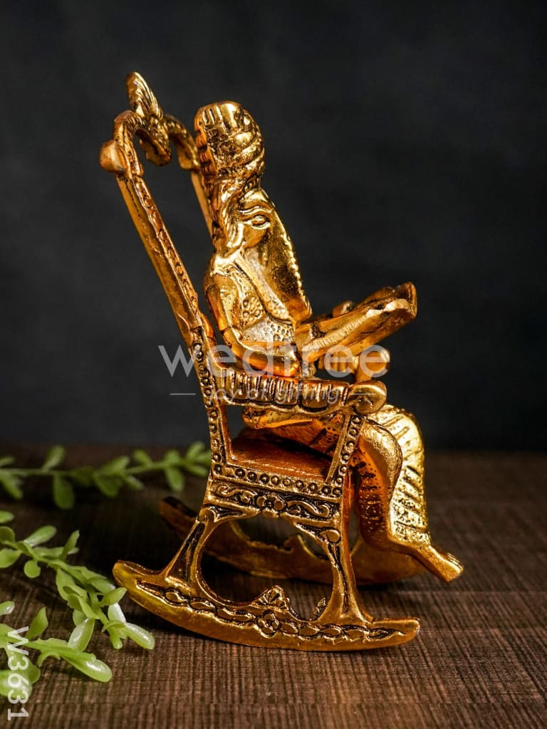 White Metal Ganesha On Chair Gold Finish - W3631 Metal