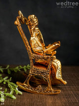 White Metal Ganesha On Chair Gold Finish - W3631 Metal