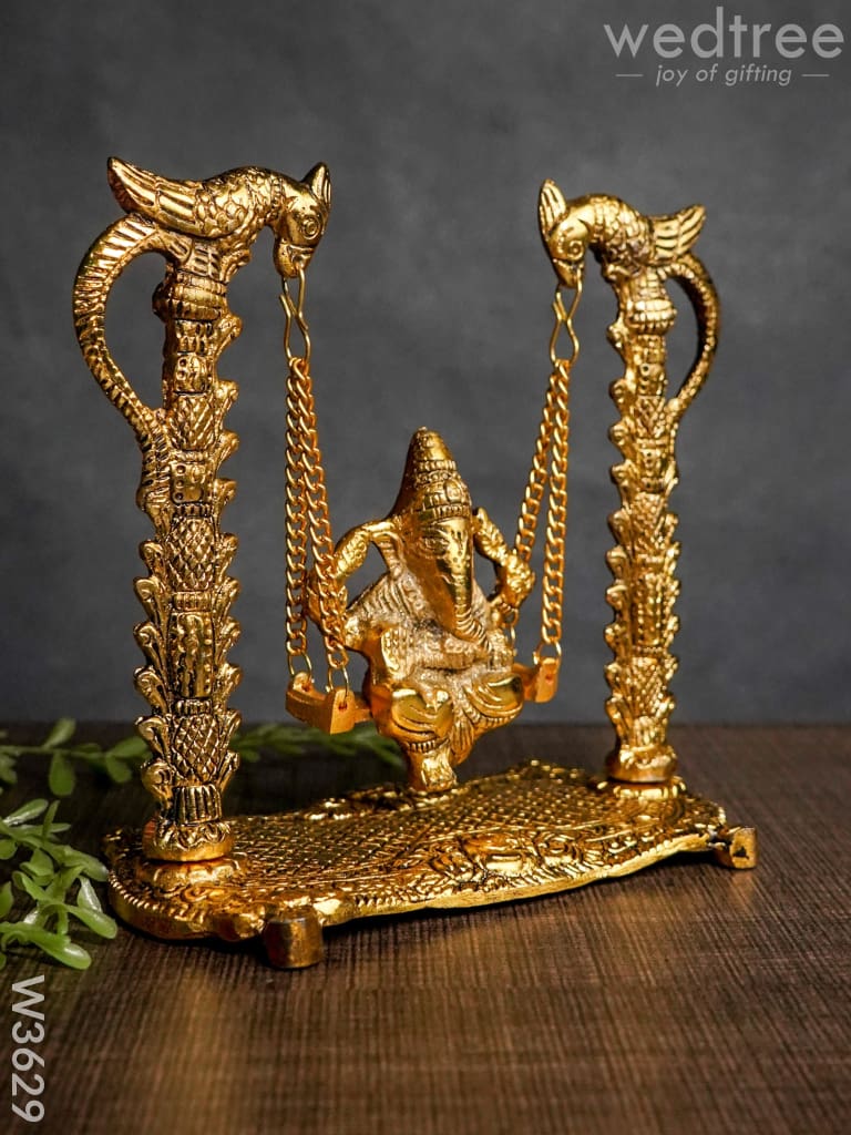 White Metal Ganesha On Swing Gold Finish - W3629