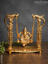 White Metal Ganesha On Swing Gold Finish - W3629