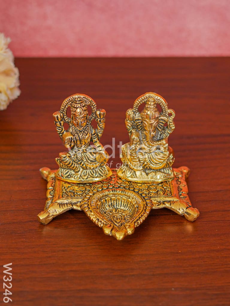 White Metal Gold Lakshmi Ganesha With Diya Divine Figurines