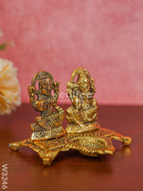 White Metal Gold Lakshmi Ganesha With Diya Divine Figurines