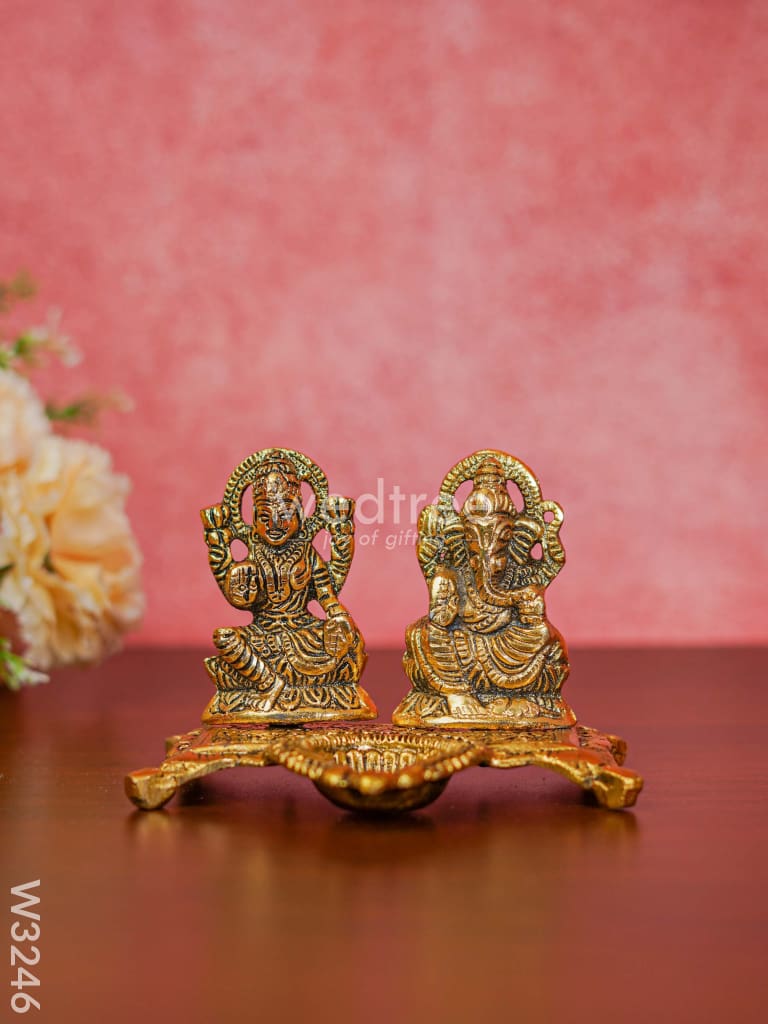 White Metal Gold Lakshmi Ganesha With Diya Divine Figurines