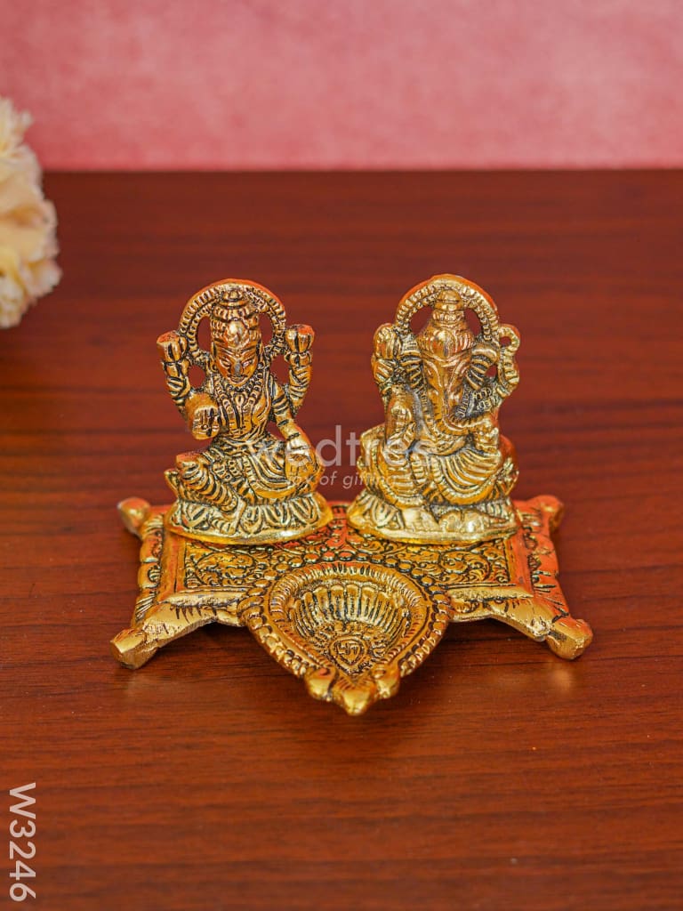 White Metal Gold Lakshmi Ganesha With Diya Divine Figurines