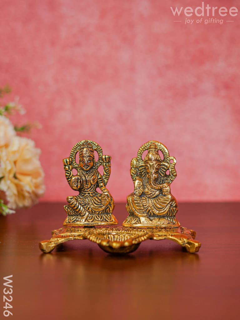 White Metal Gold Lakshmi Ganesha With Diya Divine Figurines