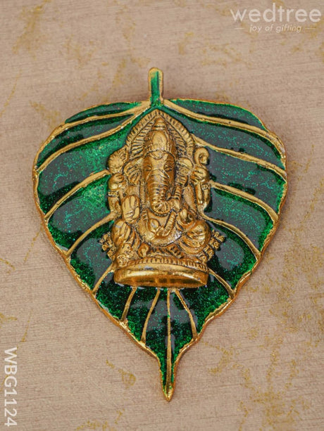 White Metal Green Leaf Ganesha Wall Hanging - Wbg1124 Divine Figurines