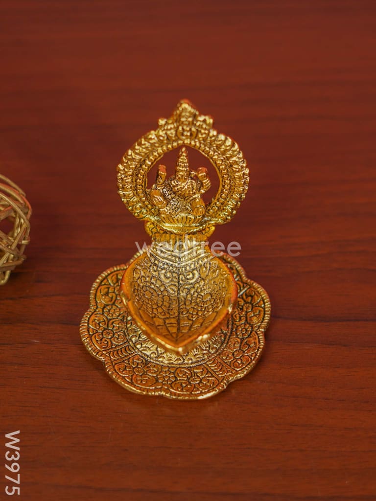 White Metal Lakshmi Hand Diya With Gold Finish - W3975 Diyas