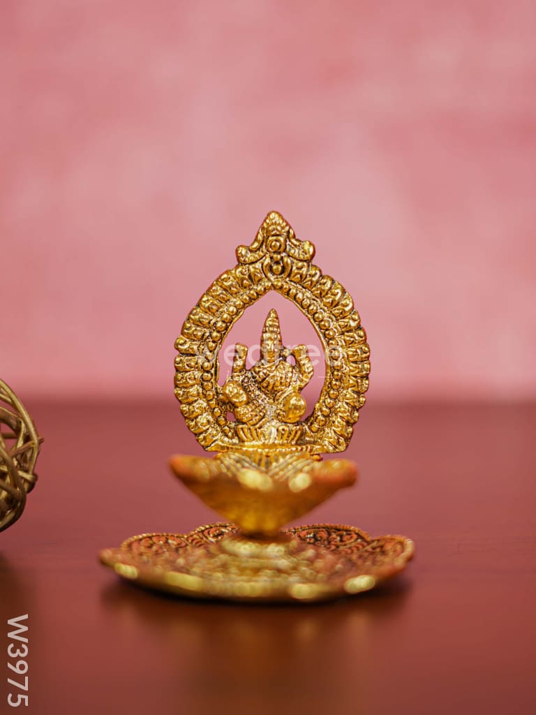 White Metal Lakshmi Hand Diya With Gold Finish - W3975 Diyas