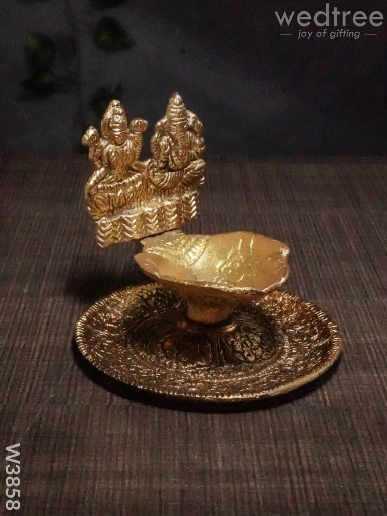 White Metal Oxidised Lakshmi Ganesh Hand Diya Gold Finish - W3858 Diyas