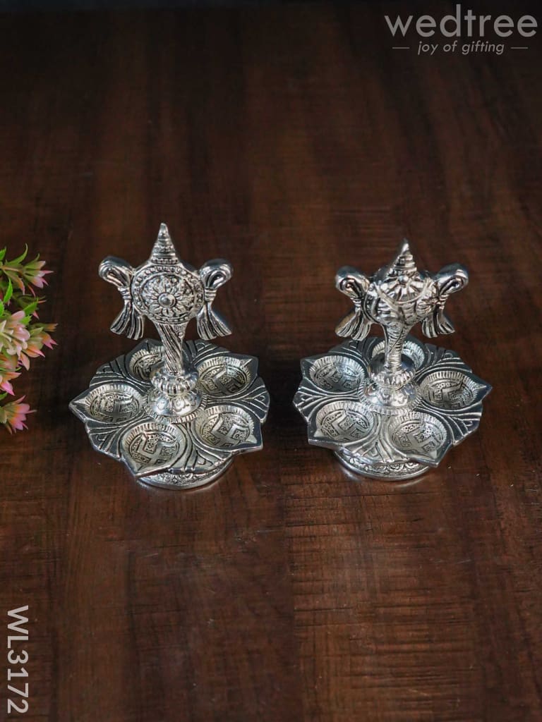 White Metal Shanku Chakra 5 Face Diya - Set Of 2 Wl3172